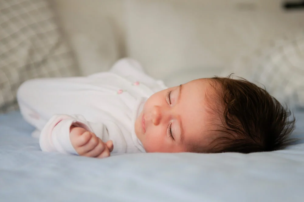 Hvordan få baby til å sove hele natten