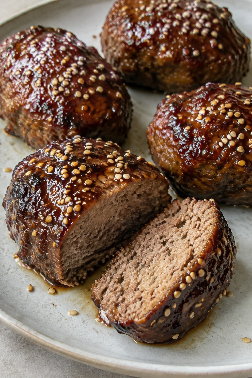 Mini Venison Meatloafs with Sesame Ginger Teriyaki Glaze and Toasted Sesame Seeds