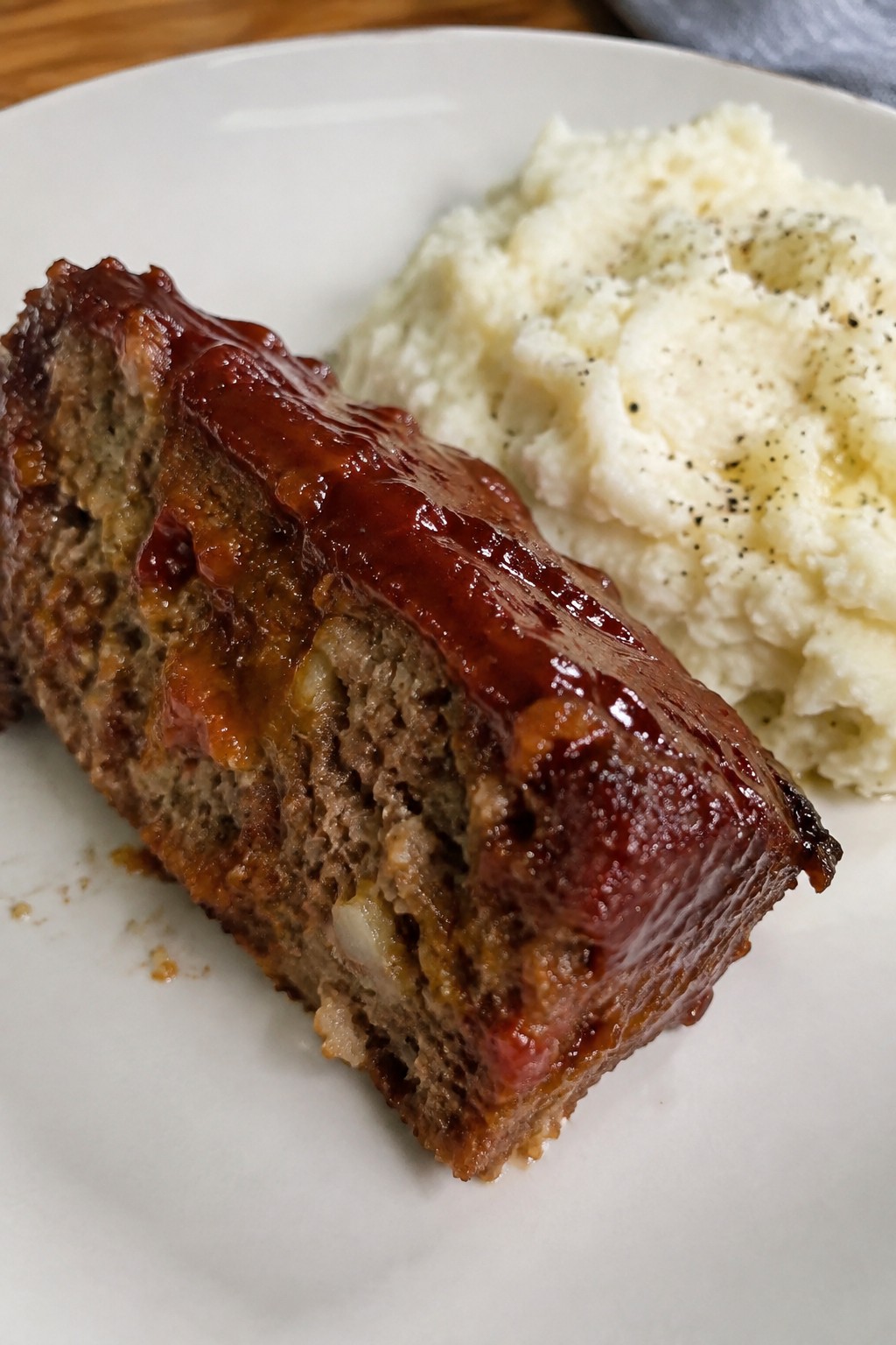 Classic Cracker Barrel Beef Meatloaf with Tomato-Brown Sugar Sauce and Mashed Potatoes